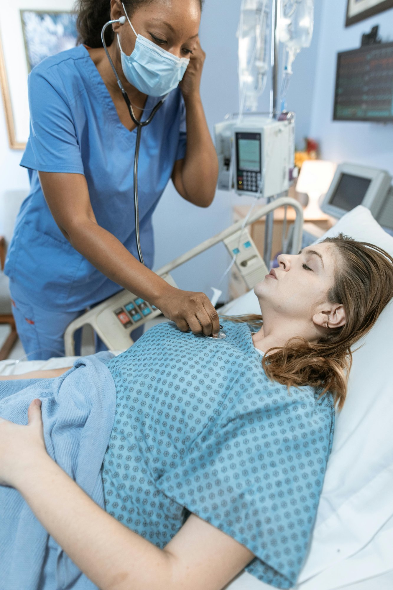 Nurse practitioner consulting with a patient