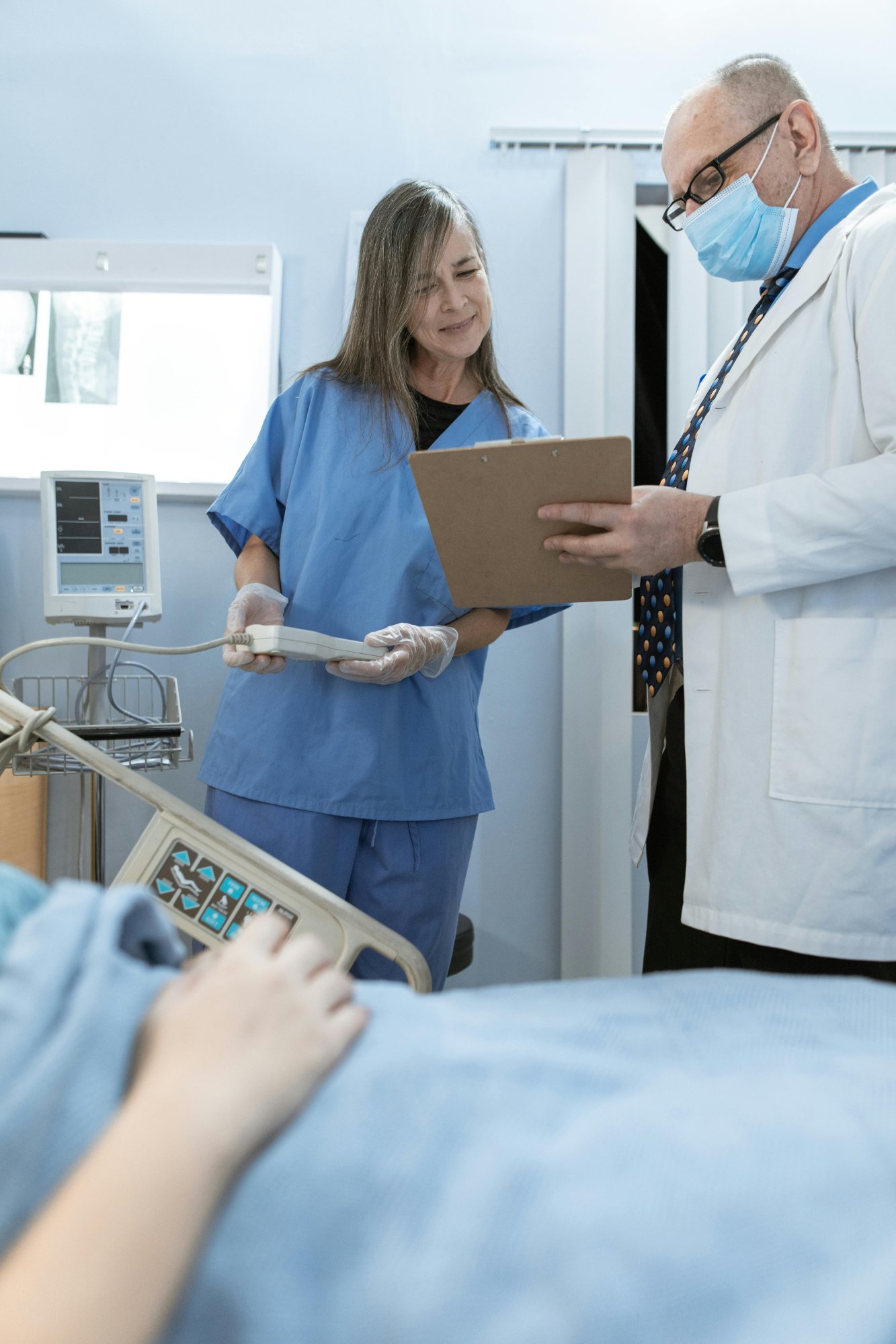 Registered nurse reviewing patient chart