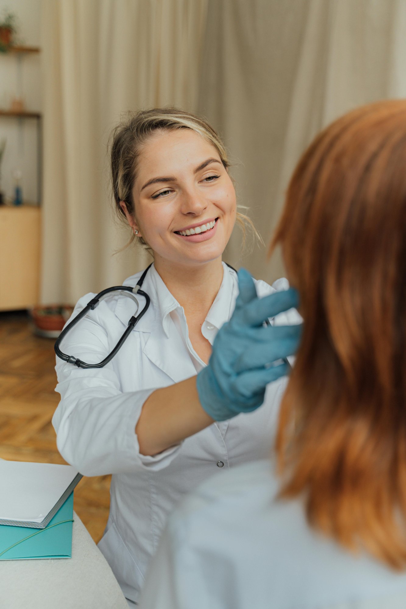 Occupational therapist working with patient on daily living activities